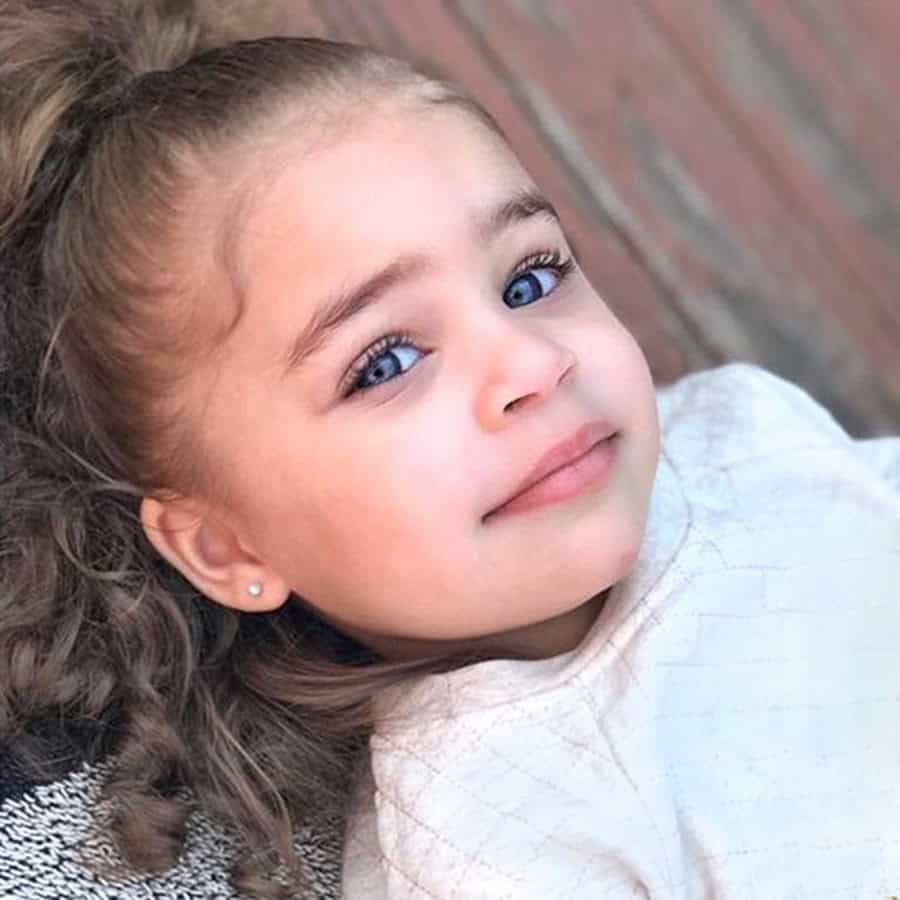 ComfyEarrings fan wearing the Mini Pearl ComfyEarrings