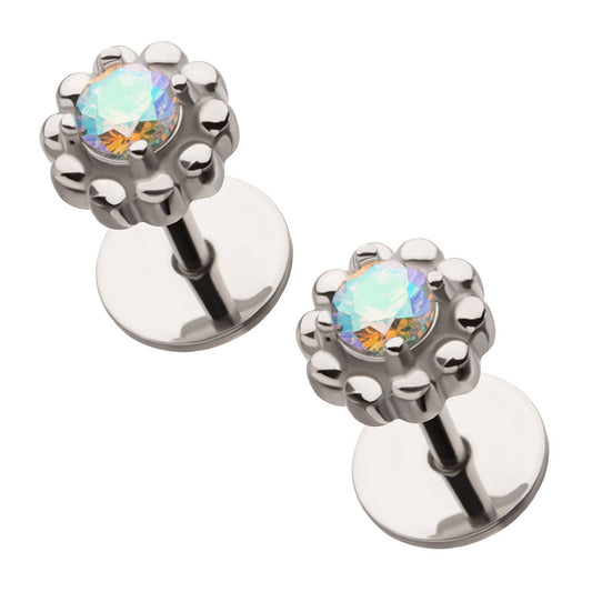 Pair of stainles steel vintage style earrings with colorful gemstones on a white background.