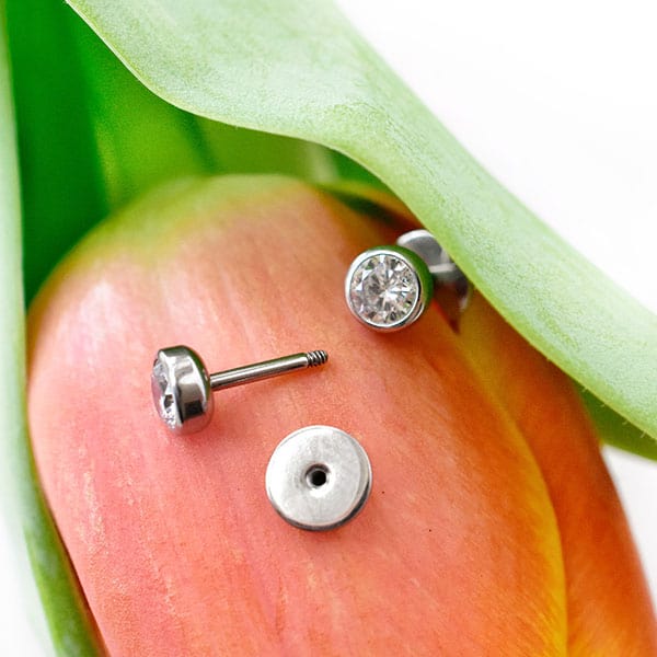 Crystal Clear ComfyEarrings on a tulip