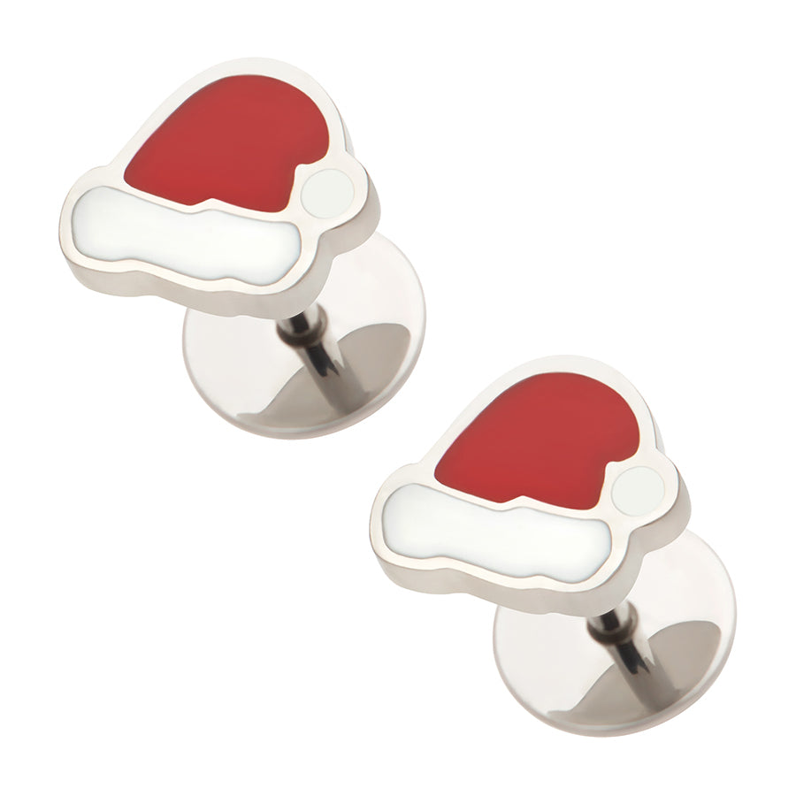 A pair of silver-toned earrings shaped like Santa hats, featuring a red top section and a white band, set against a plain white background.