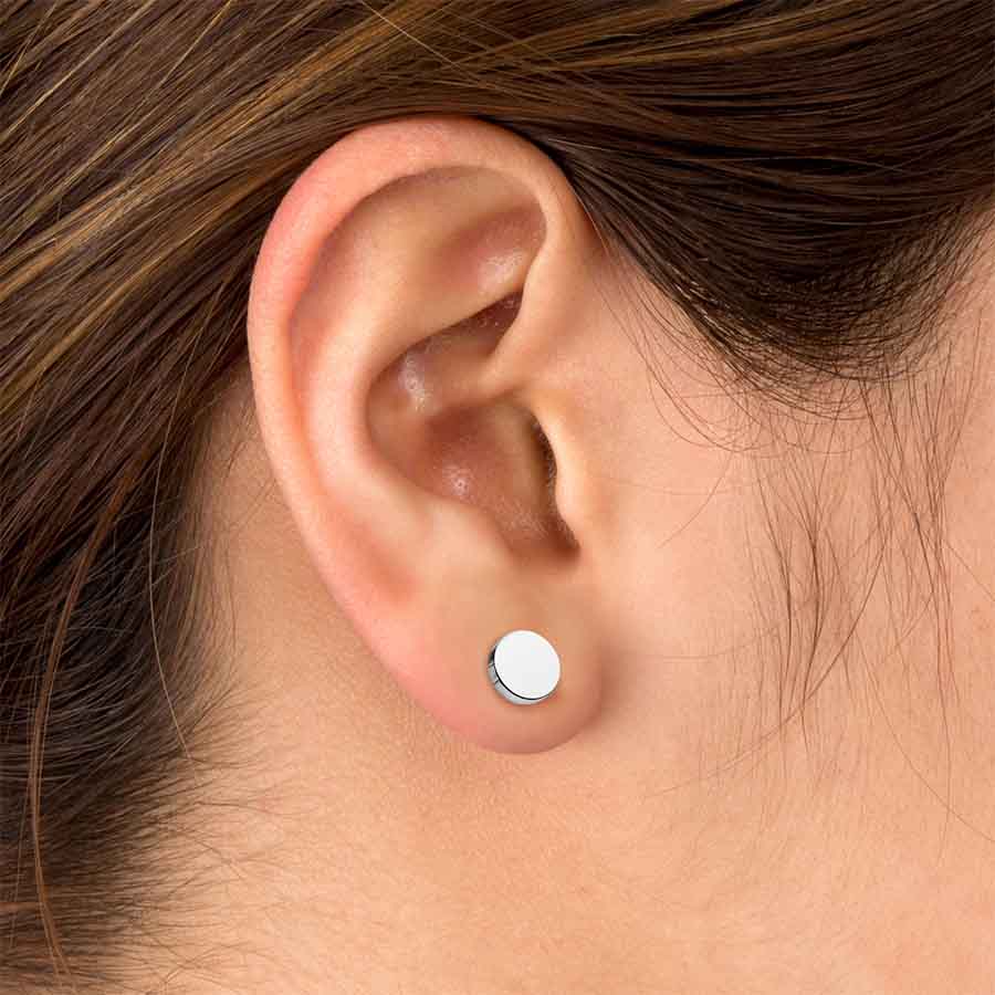 Close-up of an ear wearing a DIY stainless stud earring.
