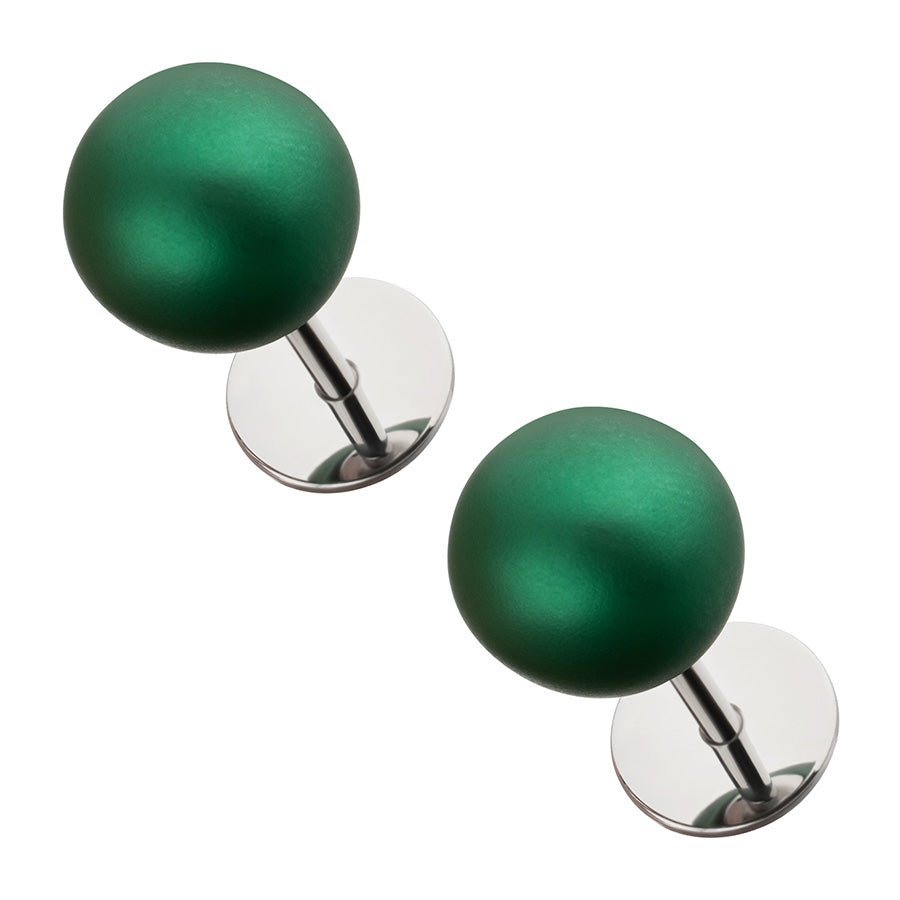 Pair of green spherical pearl earrings on white background