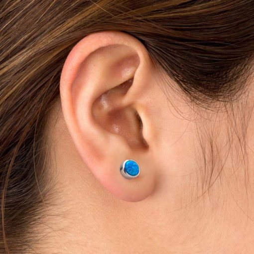 Blue Opal ComfyEarrings in ear.