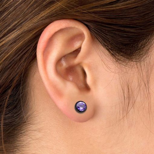 Modern Amethyst ComfyEarrings pictured in the ear.