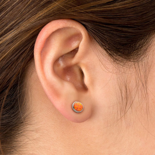 Fire Opal ComfyEarrings in an ear