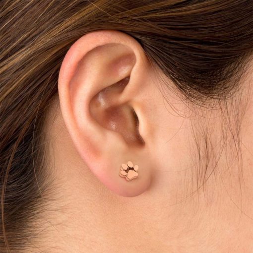 Rose Gold Paw Print ComfyEarrings in ear