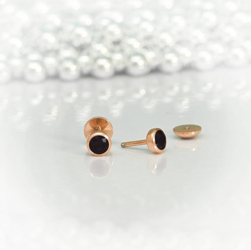 Black Onyx Rose Gold ComfyEarrings pictured in front of silver beads.