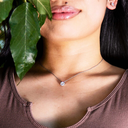 Crystal Clear Necklace by ComfyEarrings close up on model.