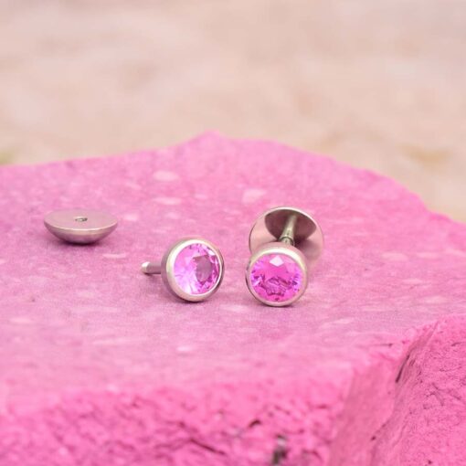 Hot Pink ComfyEarrings on a pink rock.