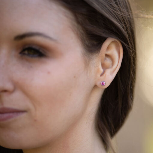 Hot Pink ComfyEarrings in a model's ear