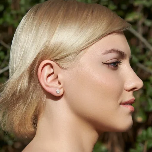 Snowflake with Gem ComfyEarrings pictured in a model's ear.